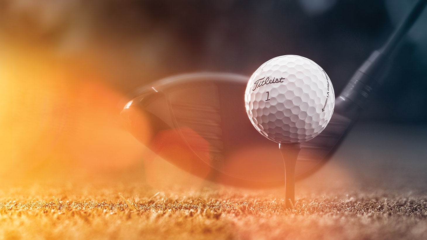 New Pro V1 golf ball on tee with Titleist TSi driver